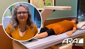 Woman in orange top lying on a medical imaging table, with an inset of her smiling at the camera.