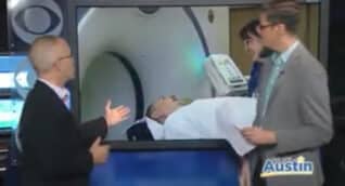 Video screen capture of a radiologist explaining the use of a PET/CT scan in nuclear medicine diagnostic procedure.